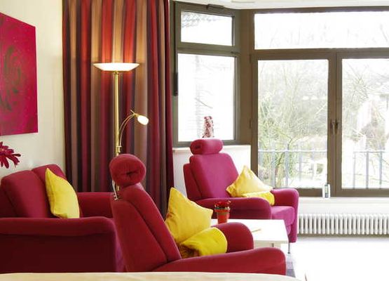 Haus Roseneck Wellness Apartments u. Ferienwohnungen - Exklusiv Apartment Ambiente mit Kamin und Dachterrasse